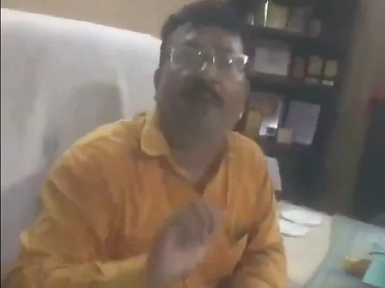 Screengrab from the video of the confrontation between the boy's mother and the principal (in frame) | - X/@HateDetectors
